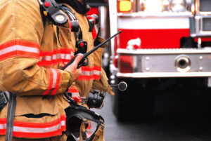 firefighter with radio communications network